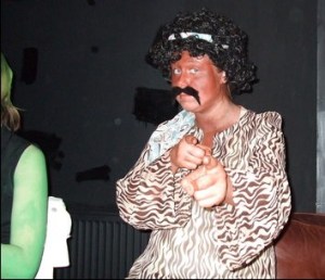 Never mind blacking up - that person next to Sharon is GREEN.  